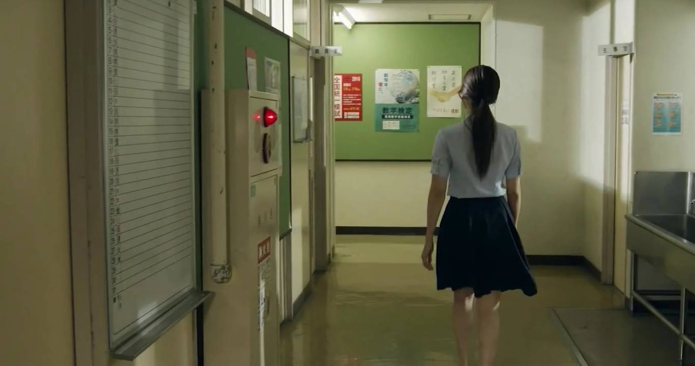 Female Teacher Closing the Door